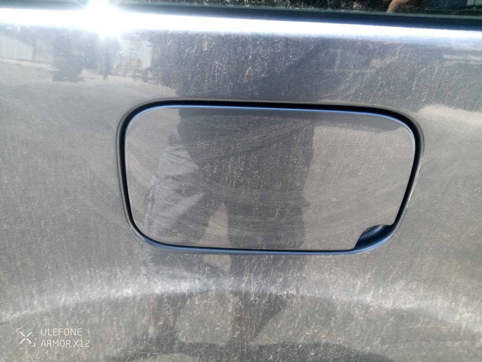 TAPA EXTERIOR COMBUSTIBLE