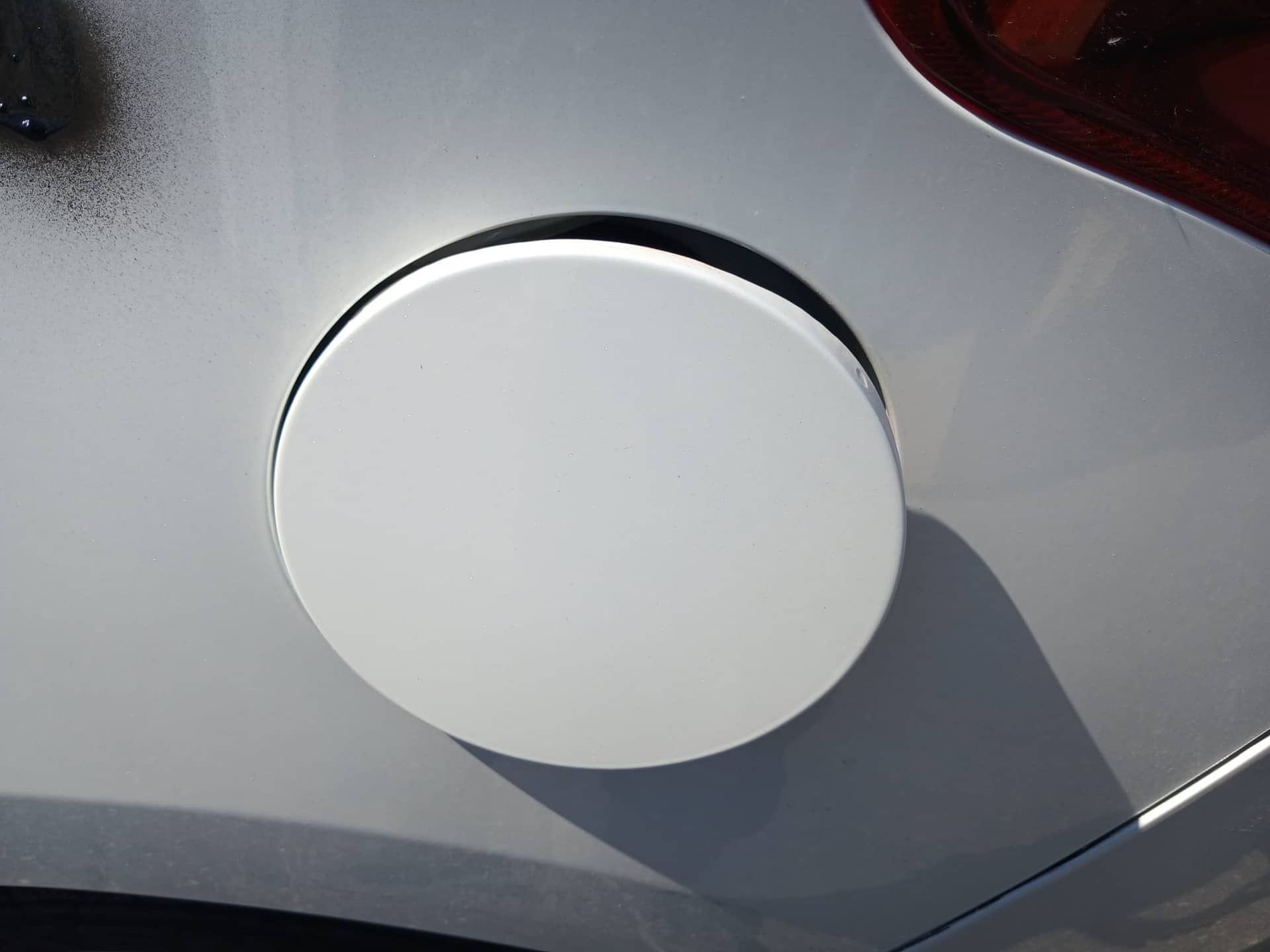 TAPA EXTERIOR COMBUSTIBLE