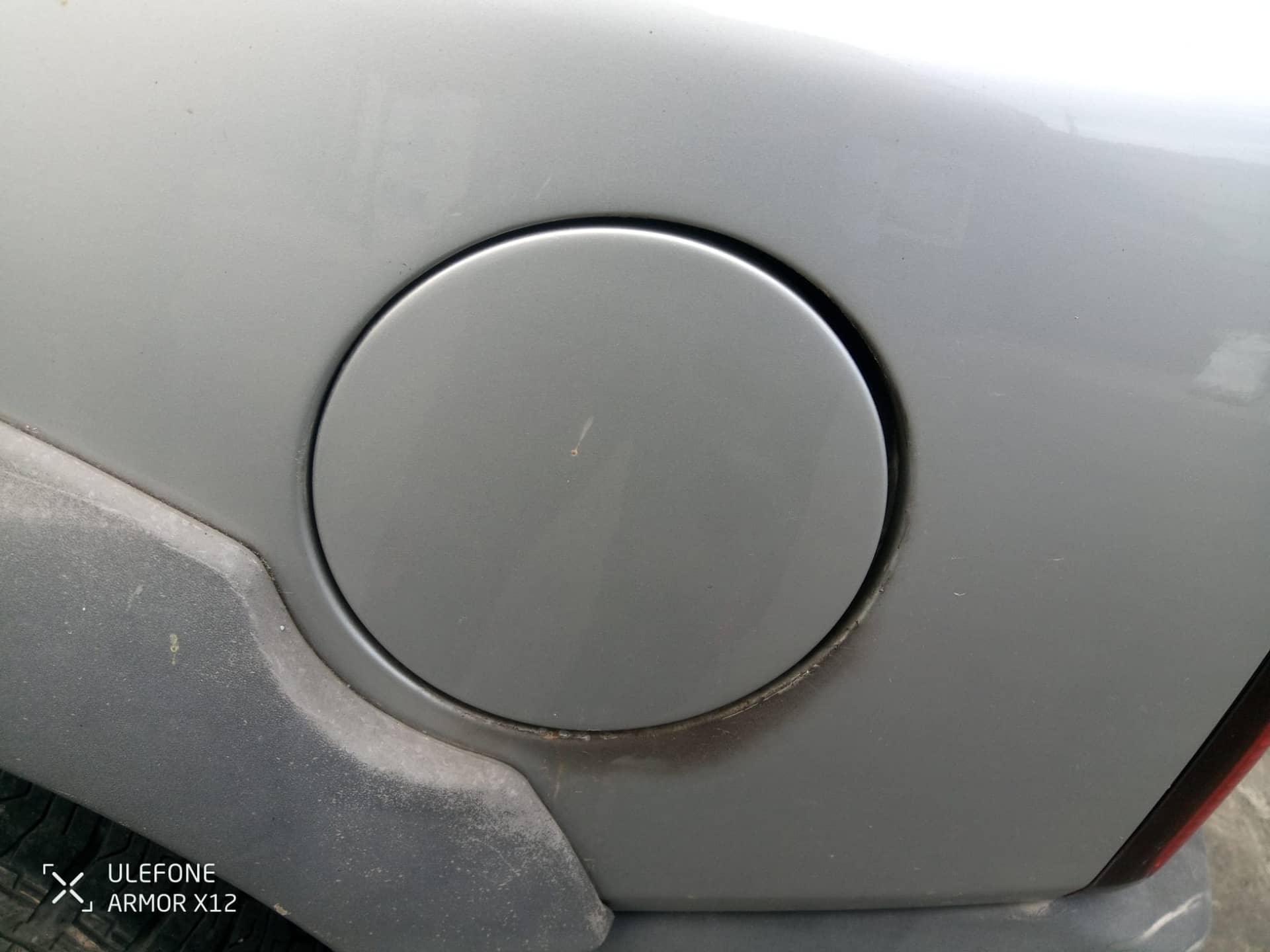 TAPA EXTERIOR COMBUSTIBLE