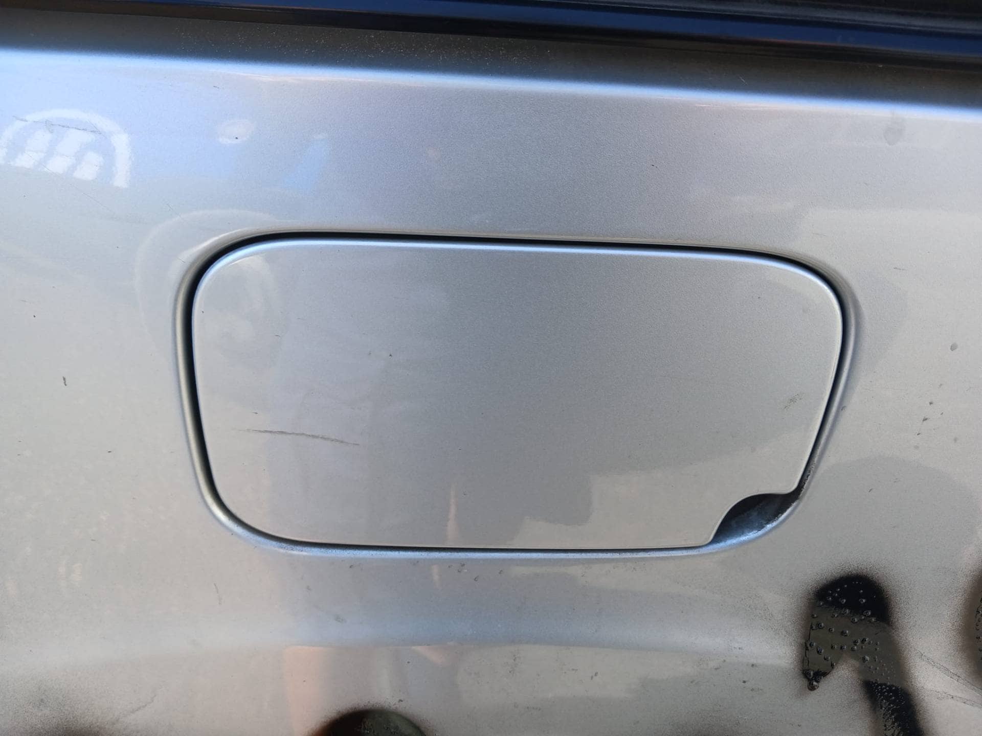 TAPA EXTERIOR COMBUSTIBLE